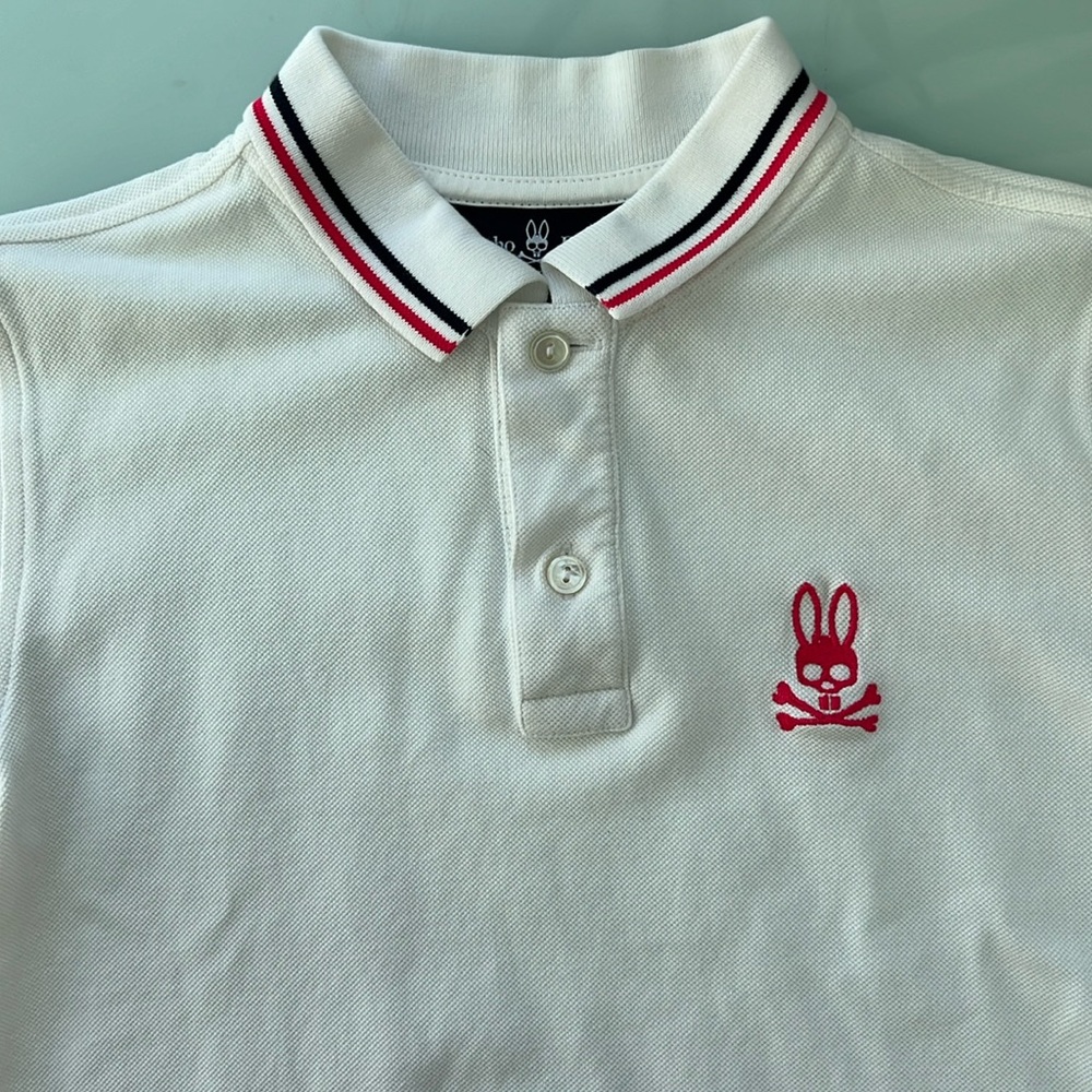 Psycho Bunny White Polo with Red and Black Trim